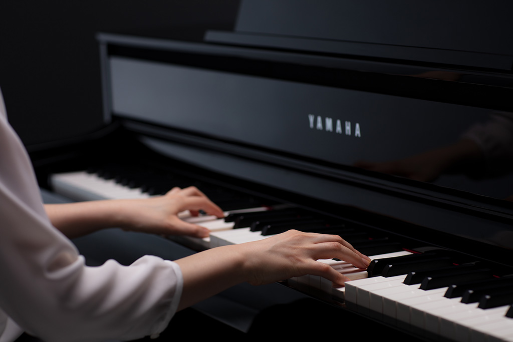 woman playing yamaha